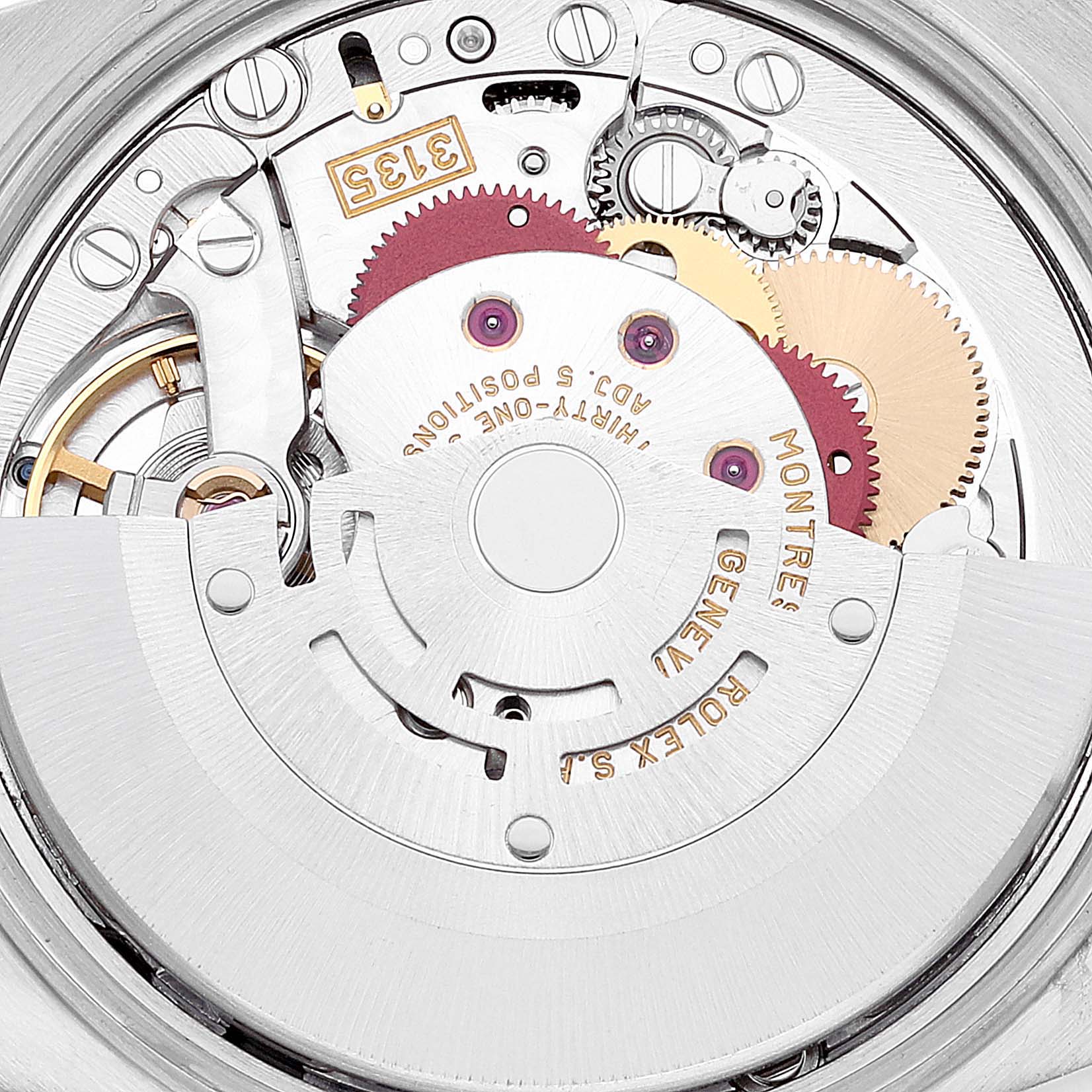 This is a close-up view of the movement mechanism of a Rolex Date 15210 Men's Stainless Steel Blue Dial 15210 Men's Stainless Steel Blue Dial model watch, showing intricate gears and components.