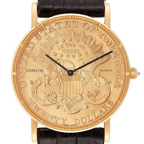 The image shows a frontal view of the Corum Coin Watch 4414556 Men's Yellow Gold Champagne Dial 4414556 Men's Yellow Gold Champagne Dial model, highlighting its detailed coin-based dial and leather strap.