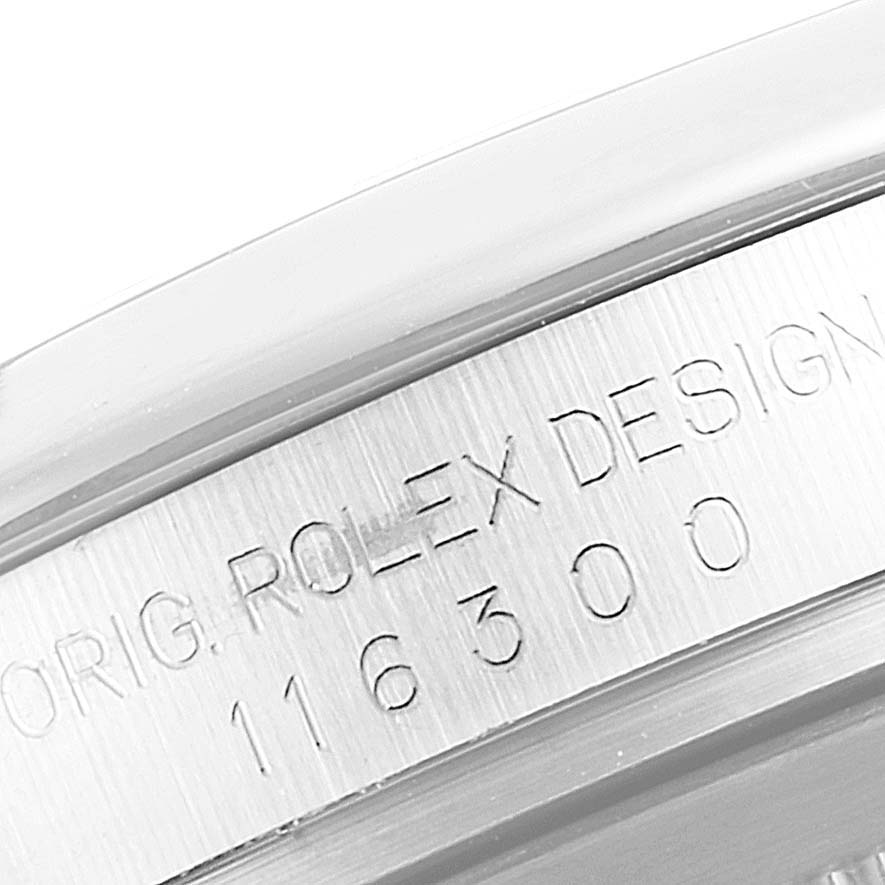 The image shows the serial number and model engraving on the side of the Rolex Datejust 41 116300 Men's Stainless Steel Blue Dial 116300 Men's Stainless Steel Blue Dial watch case.