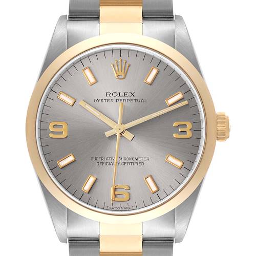 The Rolex Oyster Perpetual 14203 Men's Steel and Gold (two tone) Grey Dial 14203 Men's Steel and Gold (two tone) Grey Dial watch is shown from a frontal angle, highlighting the face, bezel, and part of the bracelet.