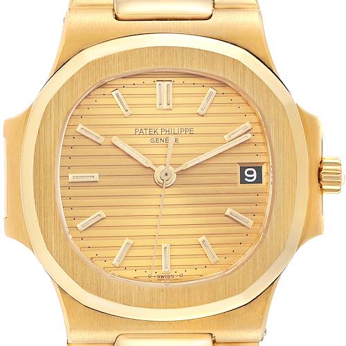 This image shows the front view of a Patek Philippe Nautilus 3800/1J Men's Yellow Gold Champagne Dial 3800/1J Men's Yellow Gold Champagne Dial watch, showcasing its dial, hands, date window, and part of the bracelet.