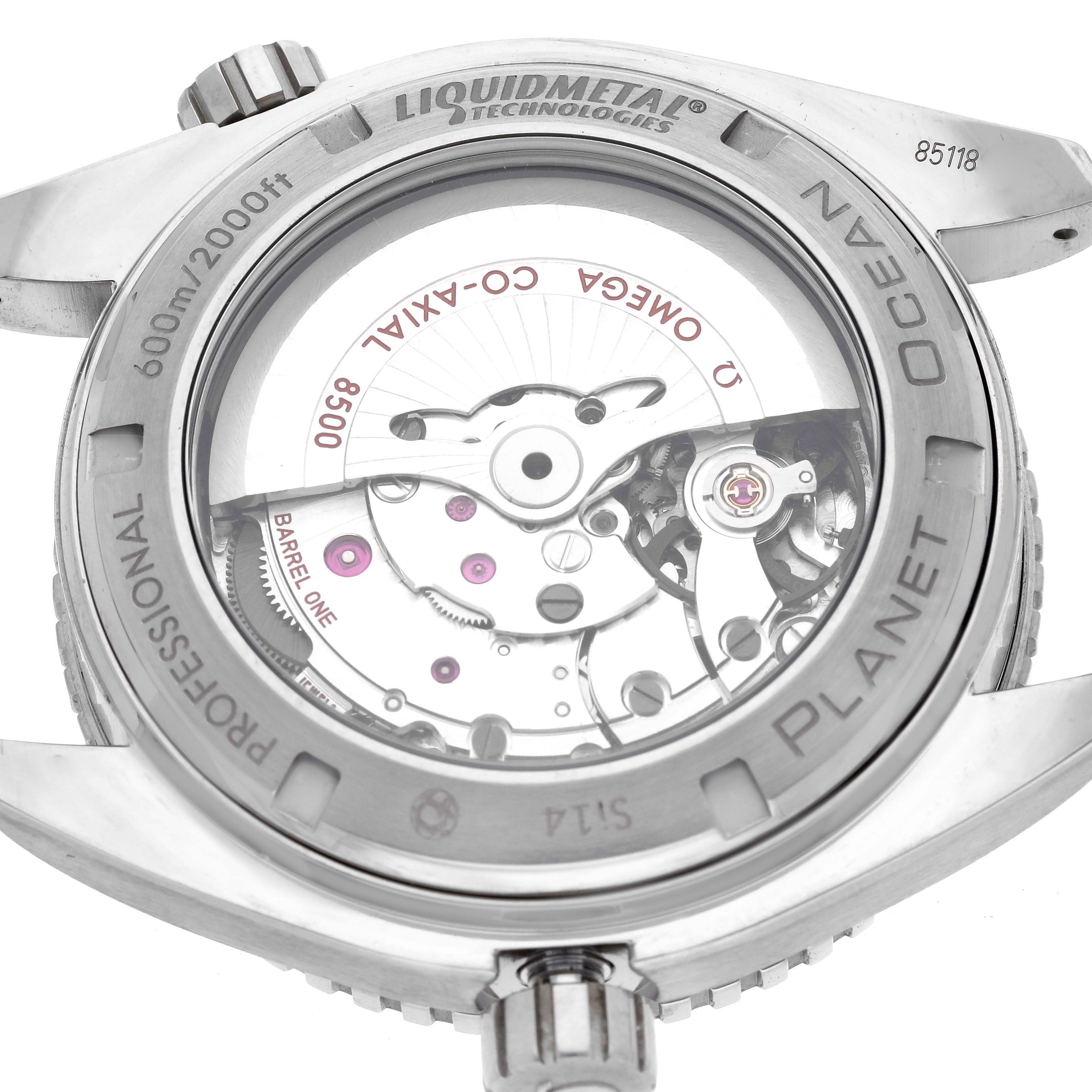 The image shows the back of the Omega Planet Ocean 232.90.46.21.03.001 Men's Titanium Blue Dial 232.90.46.21.03.001 Men's Titanium Blue Dial watch, highlighting its transparent case back and movement.