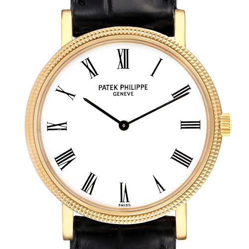 This image shows a frontal view of a Patek Philippe Calatrava 5120J Men's Yellow Gold White Dial 5120J Men's Yellow Gold White Dial watch, highlighting the dial, bezel, and part of the strap.