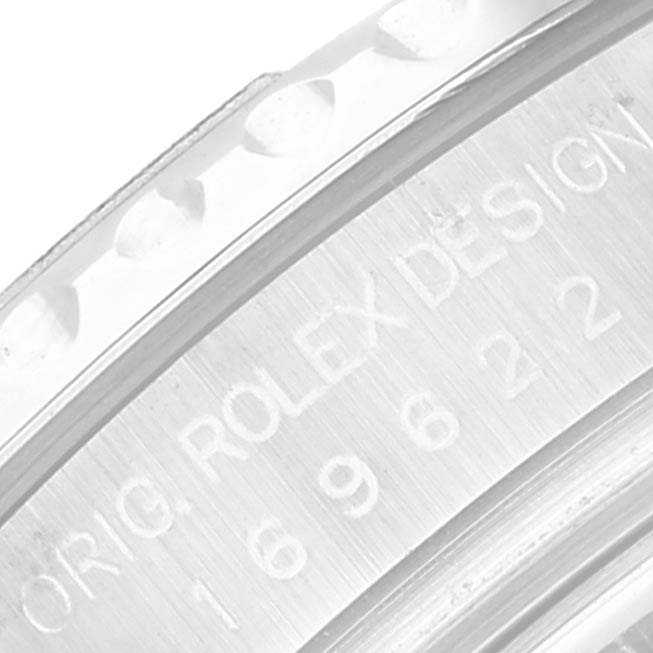 This is a close-up of the case side of a Rolex Yacht-Master 169622 Women's Stainless Steel Silver Dial 169622 Women's Stainless Steel Silver Dial, showing the engraved "Orig. Rolex Design" and serial number.