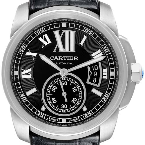 The Calibre de Cartier watch is shown from the front, highlighting the dial, Roman numerals, hands, and crown.