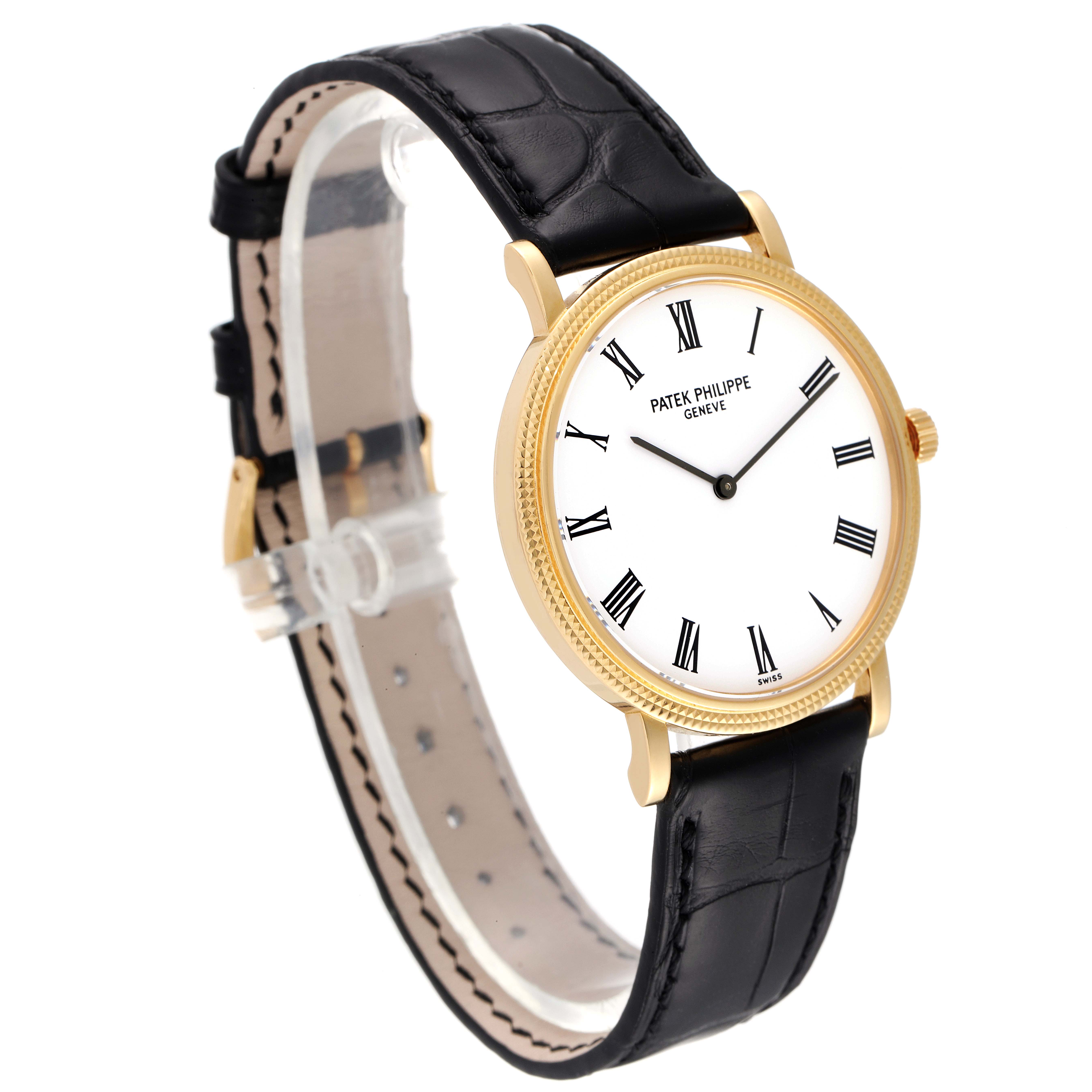 The image shows a Patek Philippe Calatrava 5120J Men's Yellow Gold White Dial 5120J Men's Yellow Gold White Dial watch at an angle displaying the face, black leather band, and side profile.