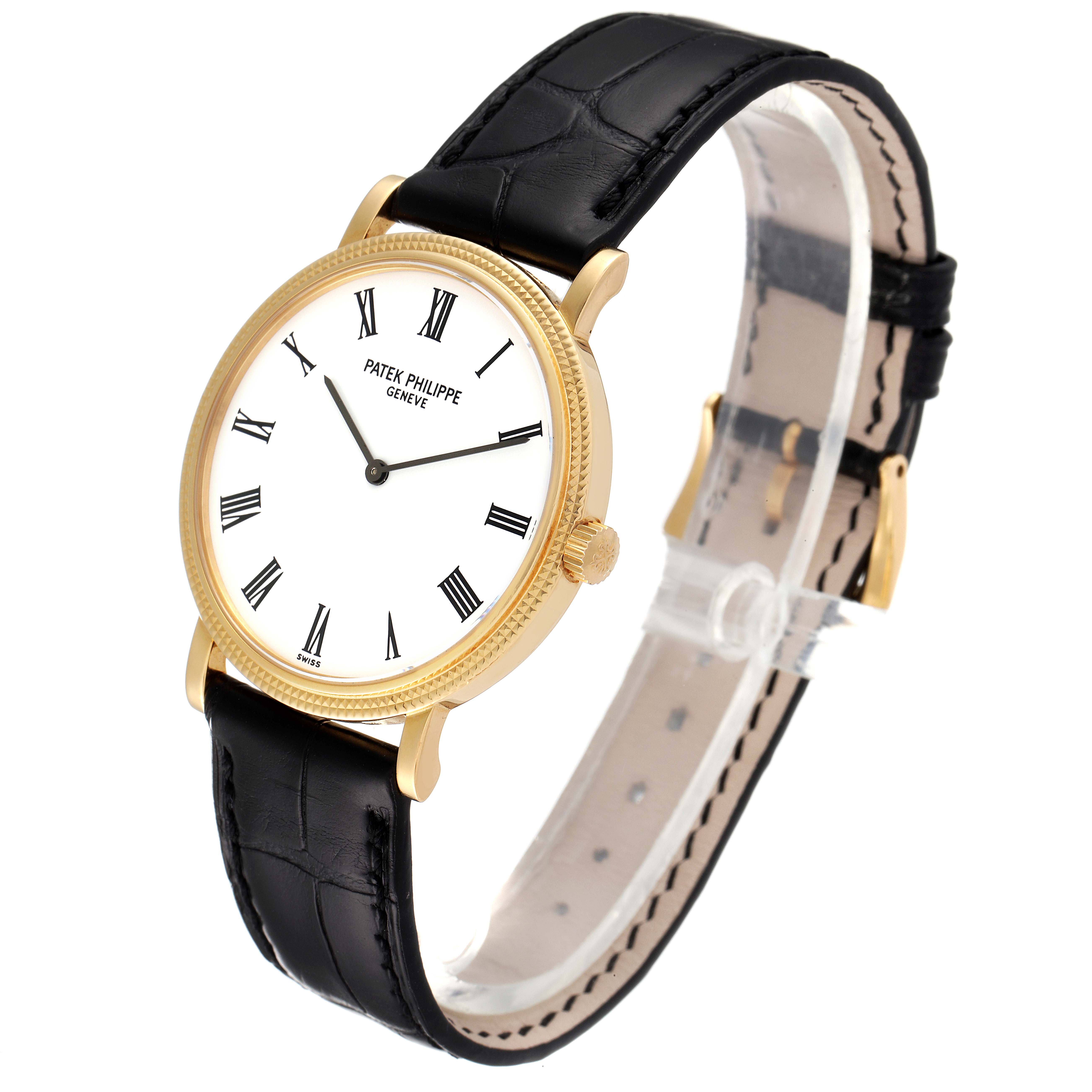 The image shows a Patek Philippe Calatrava 5120J Men's Yellow Gold White Dial 5120J Men's Yellow Gold White Dial watch with a side view, displaying the dial, bezel, crown, and leather strap.