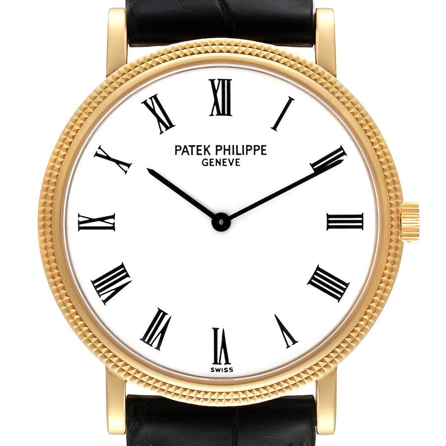 This image shows a front view of the Patek Philippe Calatrava 5120J Men's Yellow Gold White Dial 5120J Men's Yellow Gold White Dial watch, featuring its dial, hands, crown, and part of the leather strap.