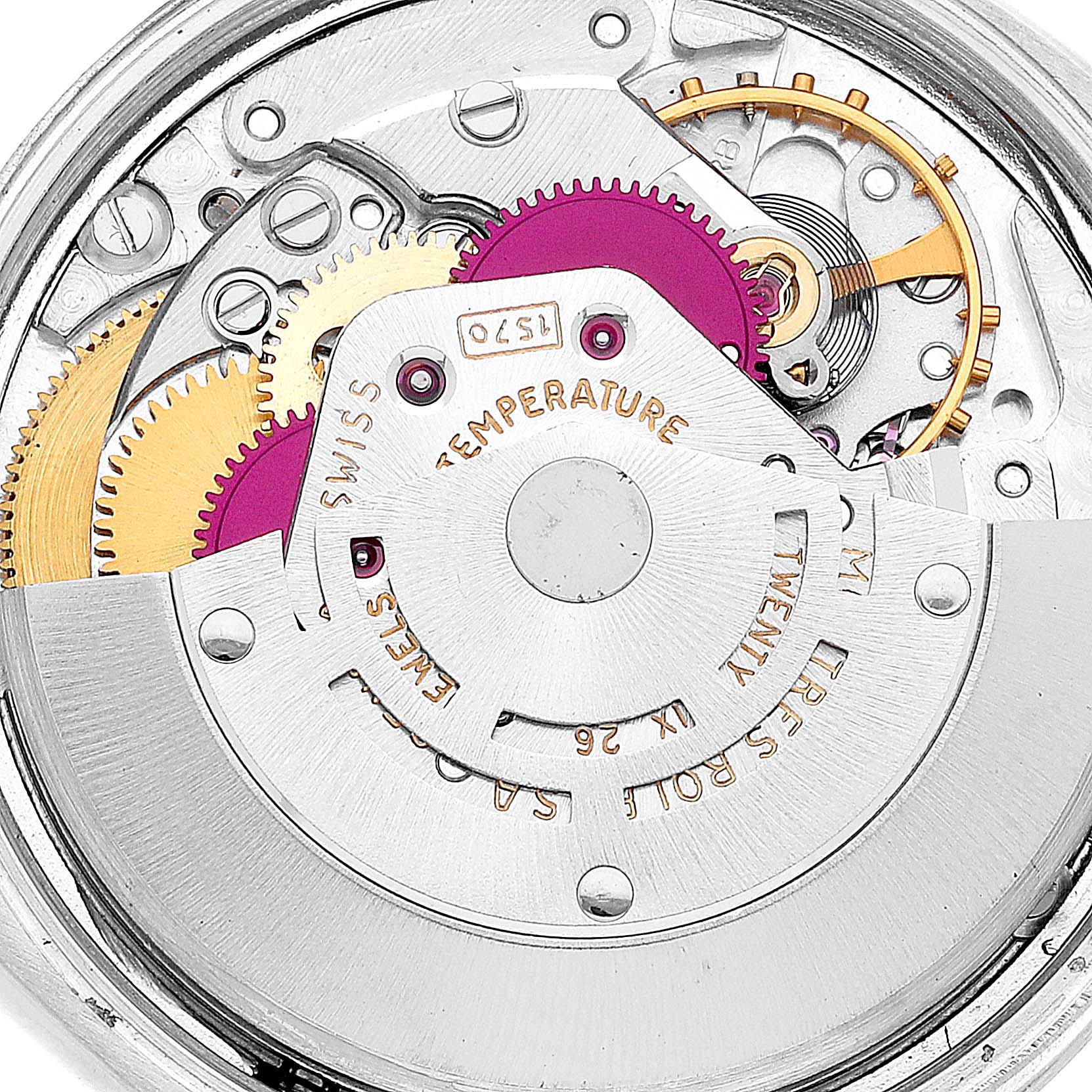 This close-up image shows the intricate mechanical movement of a Rolex Date 1500 Men's Stainless Steel Silver Dial 1500 Men's Stainless Steel Silver Dial watch model, highlighting gears and components.