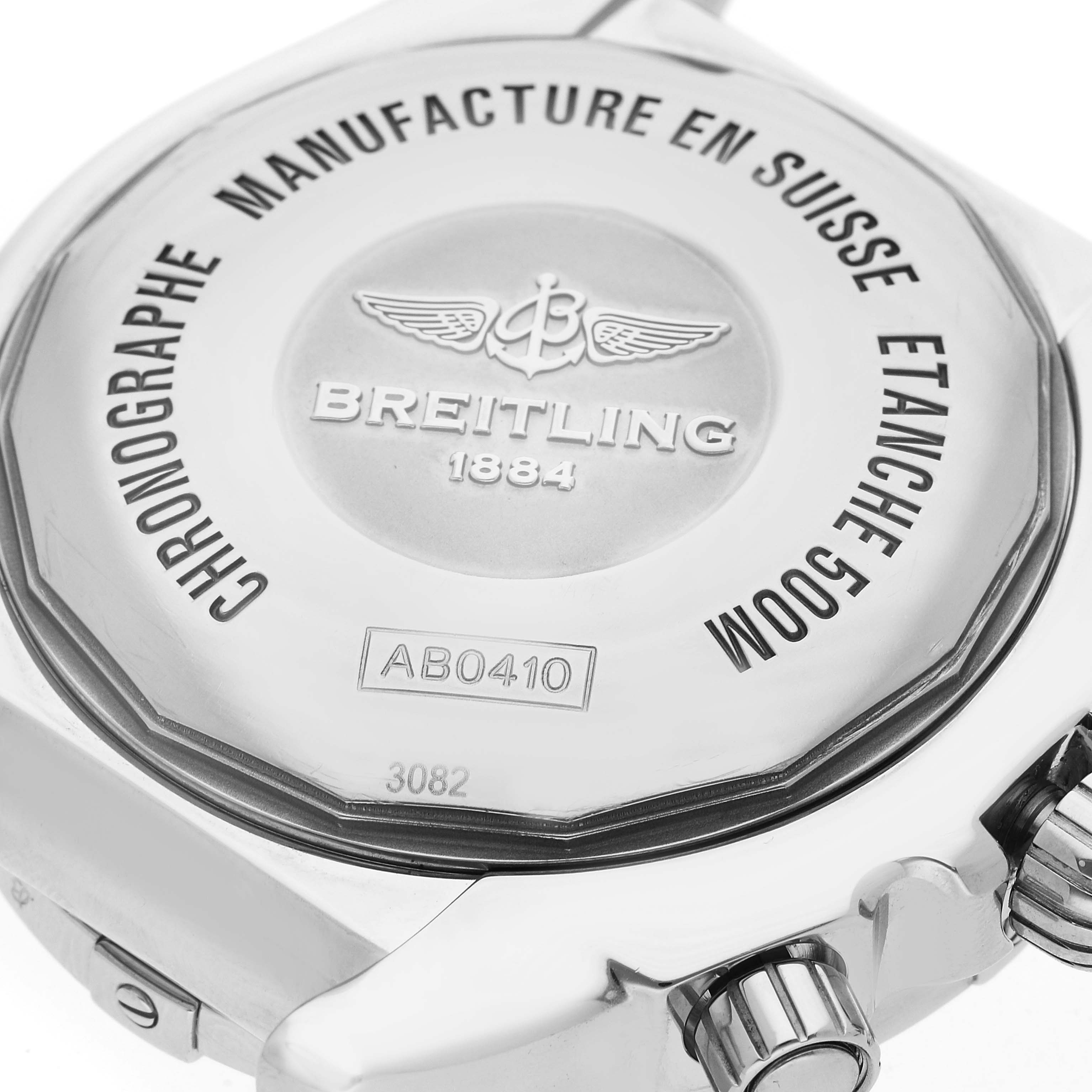The image shows the back and side of a Breitling Chronomat AB0410 Men's Stainless Steel Silver Dial AB0410 Men's Stainless Steel Silver Dial watch, highlighting the case back and crown.