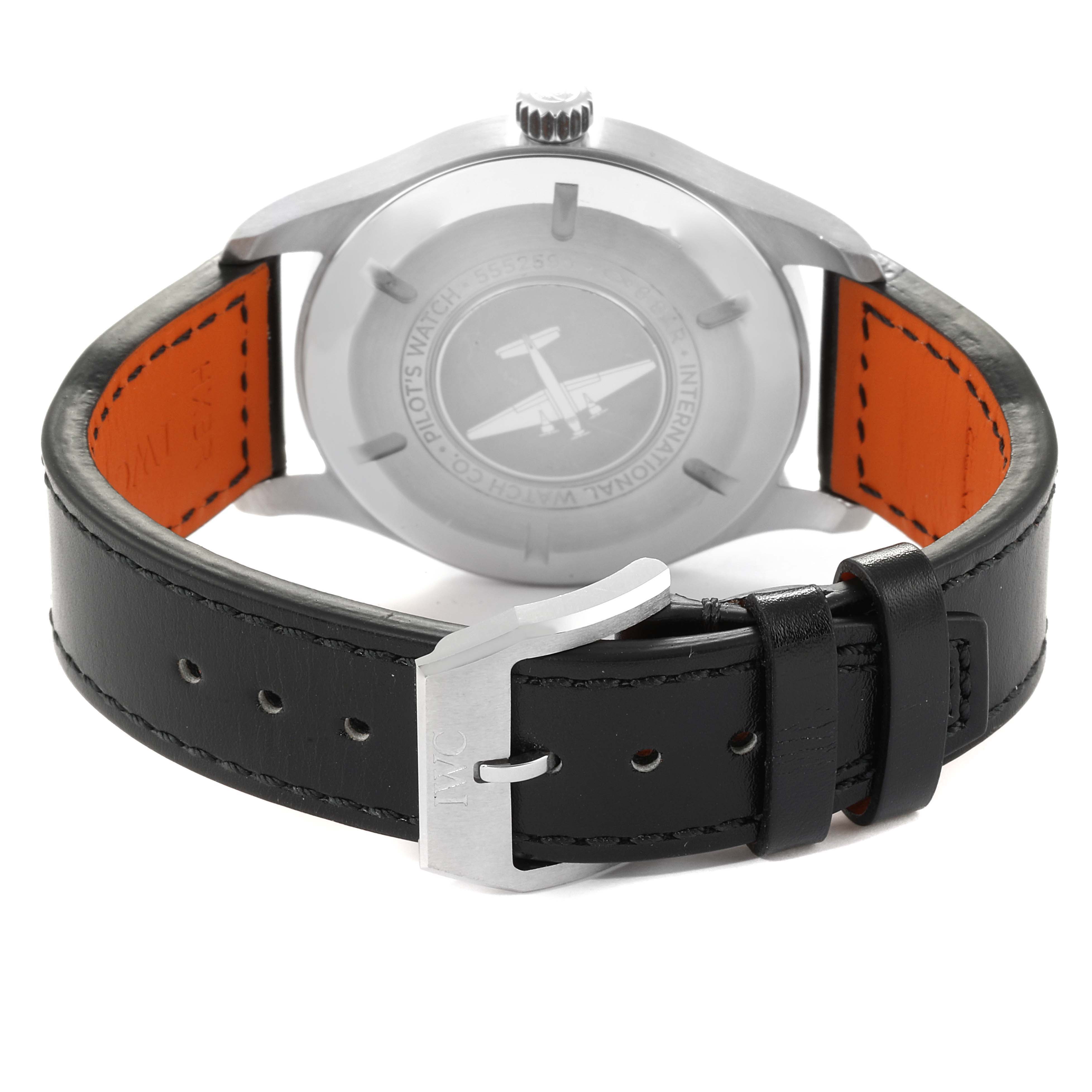 The image shows the back view of an IWC Pilot IW327001 Men's Stainless Steel Black Dial IW327001 Men's Stainless Steel Black Dial watch, highlighting its case back and black leather strap with orange lining.