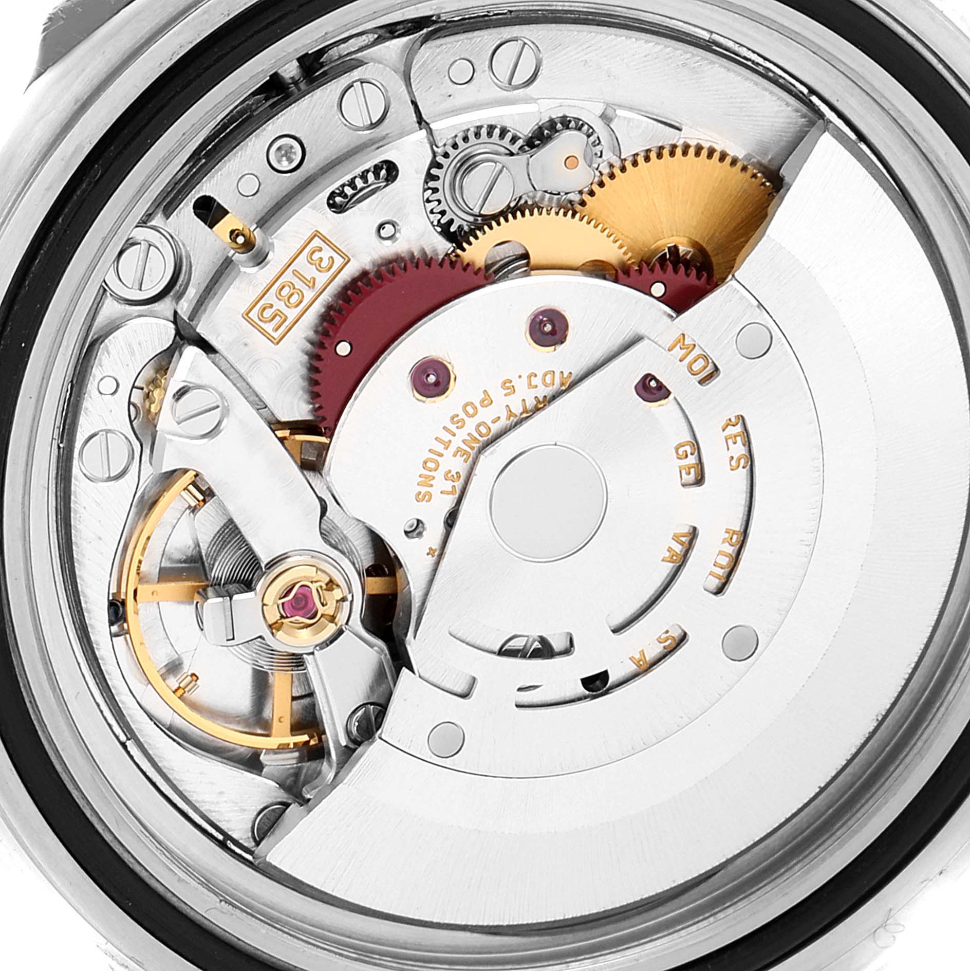 This image shows a close-up of the detailed movement mechanism inside a Rolex Explorer 16570 Men's Stainless Steel White Dial 16570 Men's Stainless Steel White Dial watch.