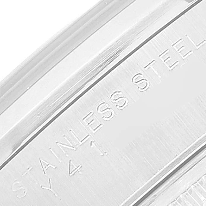 This image shows the inner case back of a Rolex Date 15200 Men's Stainless Steel Black Dial 15200 Men's Stainless Steel Black Dial model watch engraved with "STAINLESS STEEL."