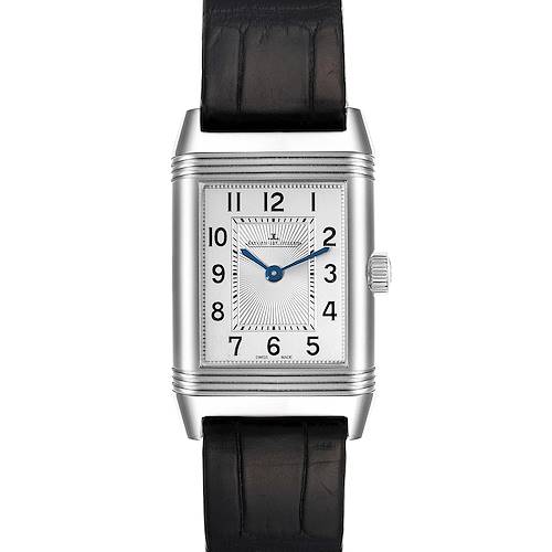 The image shows a front view of a Jaeger-LeCoultre Reverso watch, highlighting its rectangular face, black strap, and crown.