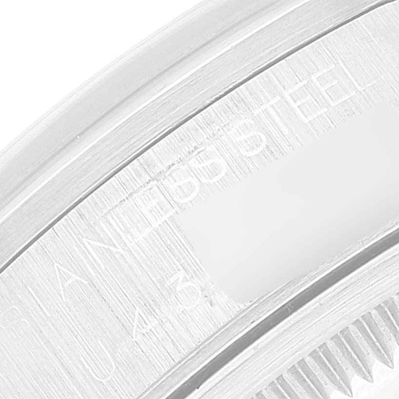 This is a close-up of the side details on the bezel of the Rolex Date 15200 Men's Stainless Steel Black Dial 15200 Men's Stainless Steel Black Dial model, showing "STAINLESS STEEL" engraving.