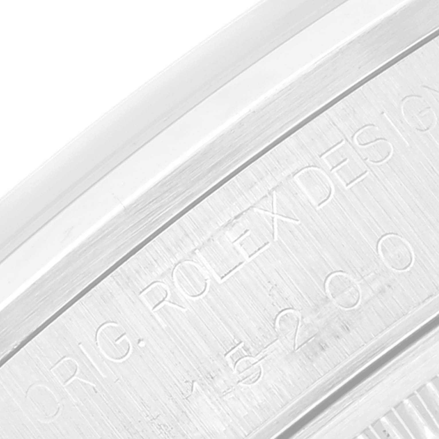 The image shows a close-up view of the serial number and engravings on the case of a Rolex Date 15200 Men's Stainless Steel Black Dial 15200 Men's Stainless Steel Black Dial model watch.