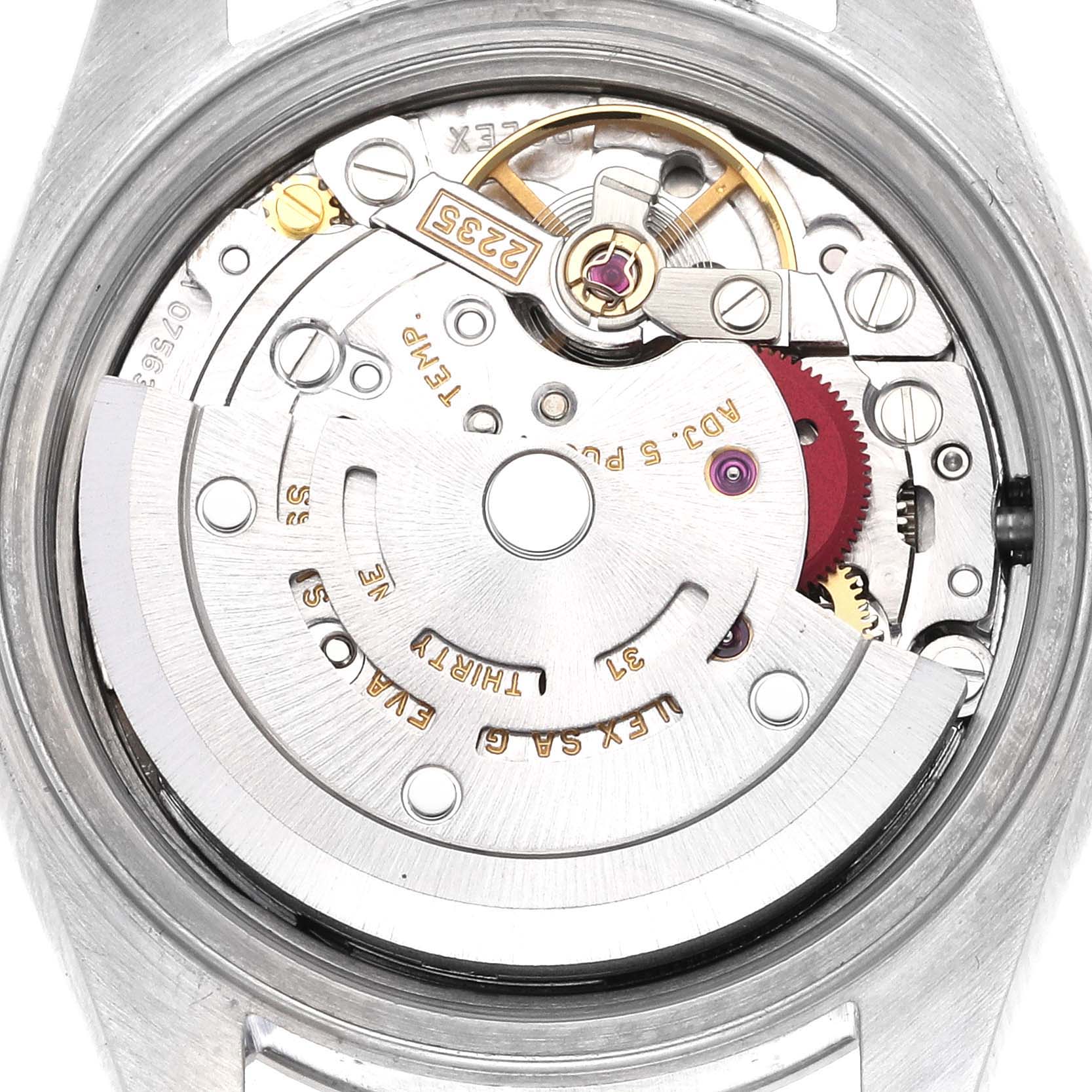 The image shows the movement of a Rolex Date 79190 Women's Stainless Steel Silver Dial 79190 Women's Stainless Steel Silver Dial model watch from a top-down angle, highlighting gearing and components.