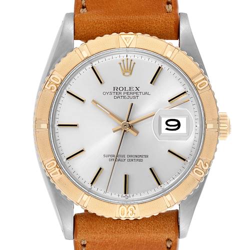 The Rolex Vintage Collection 1625 Men's Steel and Gold (two tone) Silver Dial 1625 Men's Steel and Gold (two tone) Silver Dial watch is shown from a front angle, displaying its dial, bezel, and leather strap.