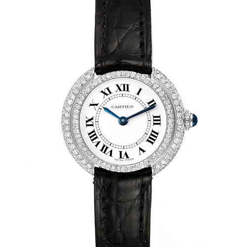 The image shows a Vendome model by Cartier from a top view, featuring a black leather strap, diamond-set bezel, and Roman numeral dial.