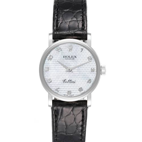 The Rolex Cellini 6110/9 Women's White Gold Mother of Pearl Dial 6110/9 Women's White Gold Mother of Pearl Dial watch is shown from a front angle, displaying the face, hands, and leather strap.