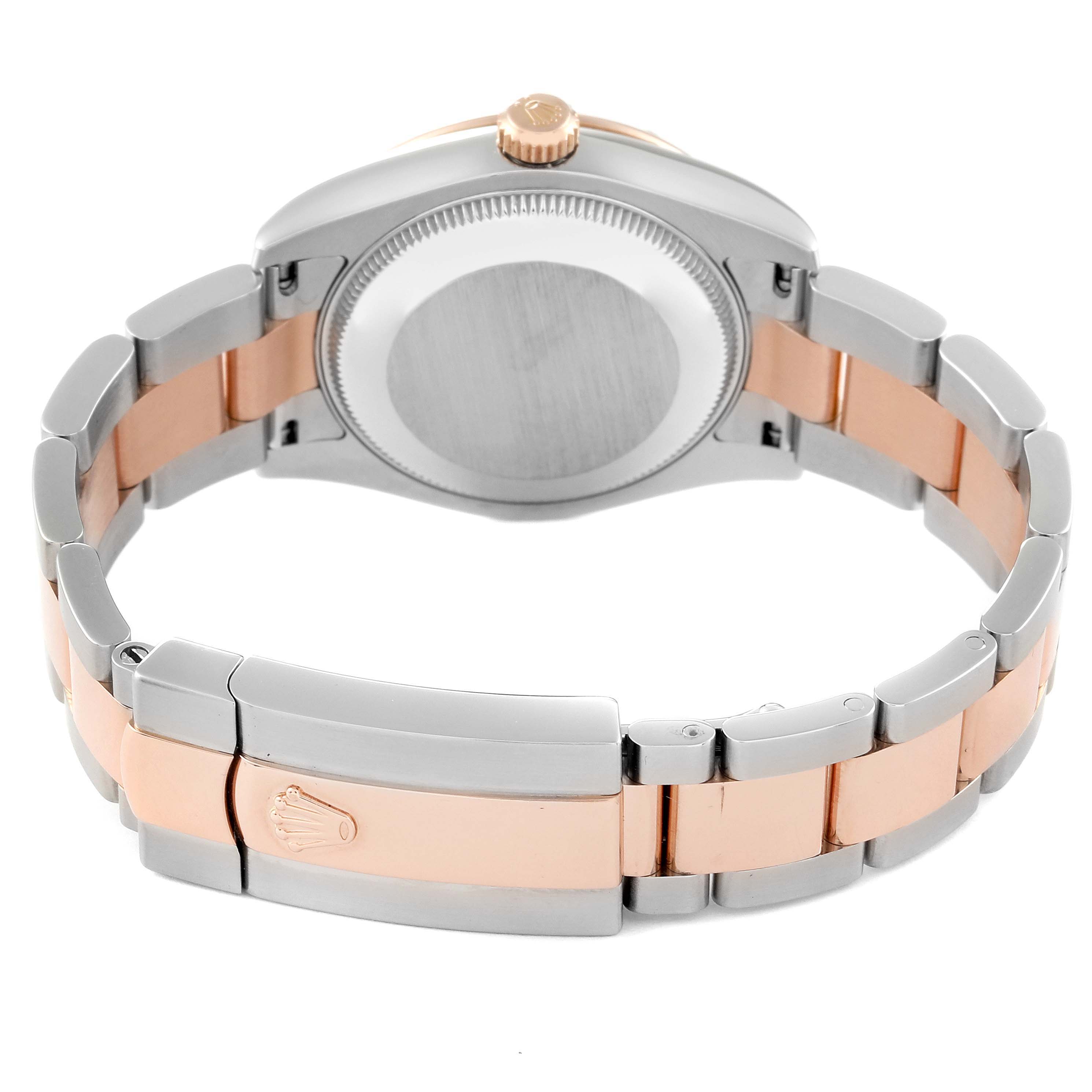 The image shows the back and bracelet of a Rolex Mid-Size 178341 Women's Steel and Gold (two tone) Mother of Pearl Dial 178341 Women's Steel and Gold (two tone) Mother of Pearl Dial model, featuring a two-tone design and the clasp with the Rolex crown logo.