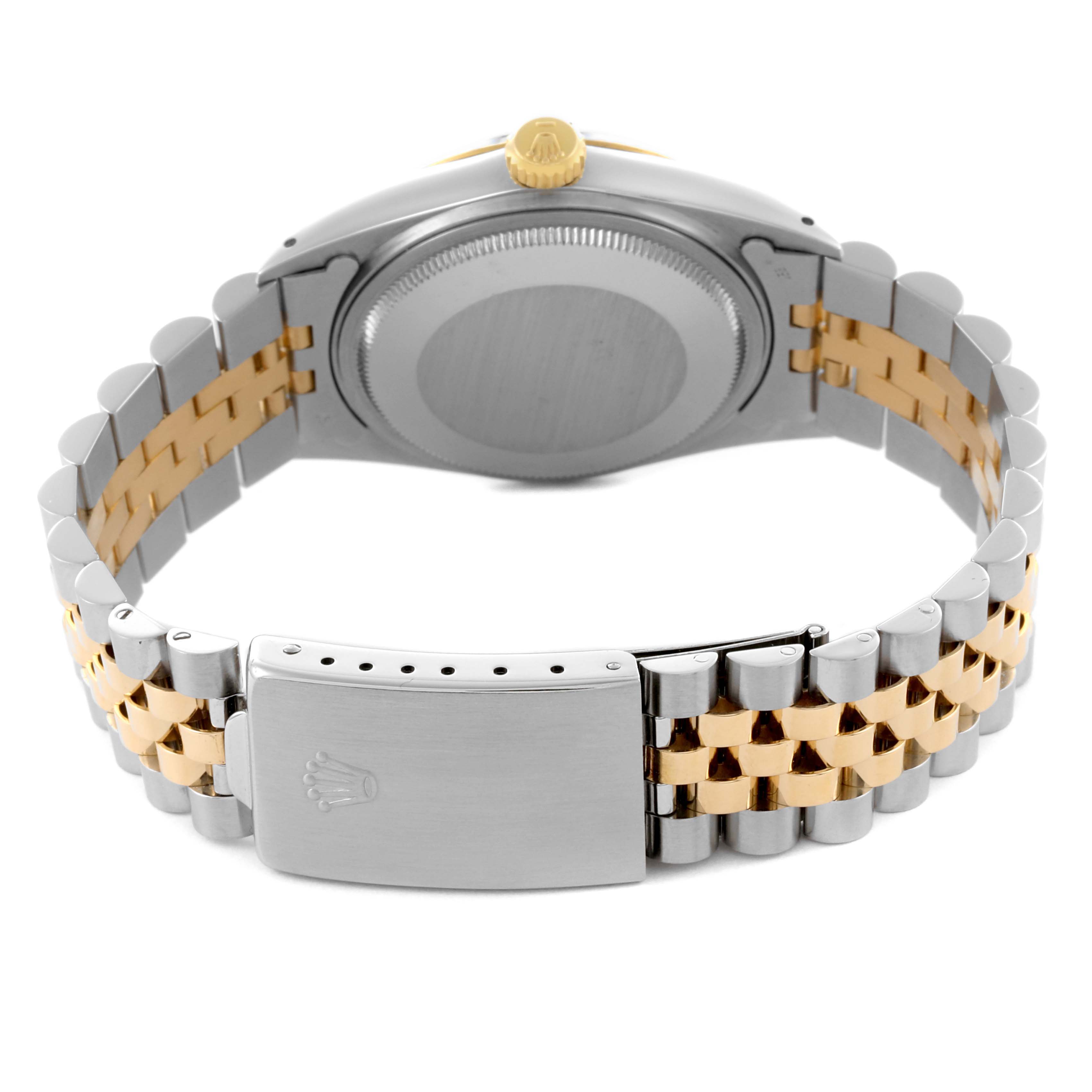 The image shows the back and clasp of a Rolex Datejust 16013 Men's Steel and Gold (two tone) Champagne Dial 16013 Men's Steel and Gold (two tone) Champagne Dial, featuring a two-tone metal bracelet.