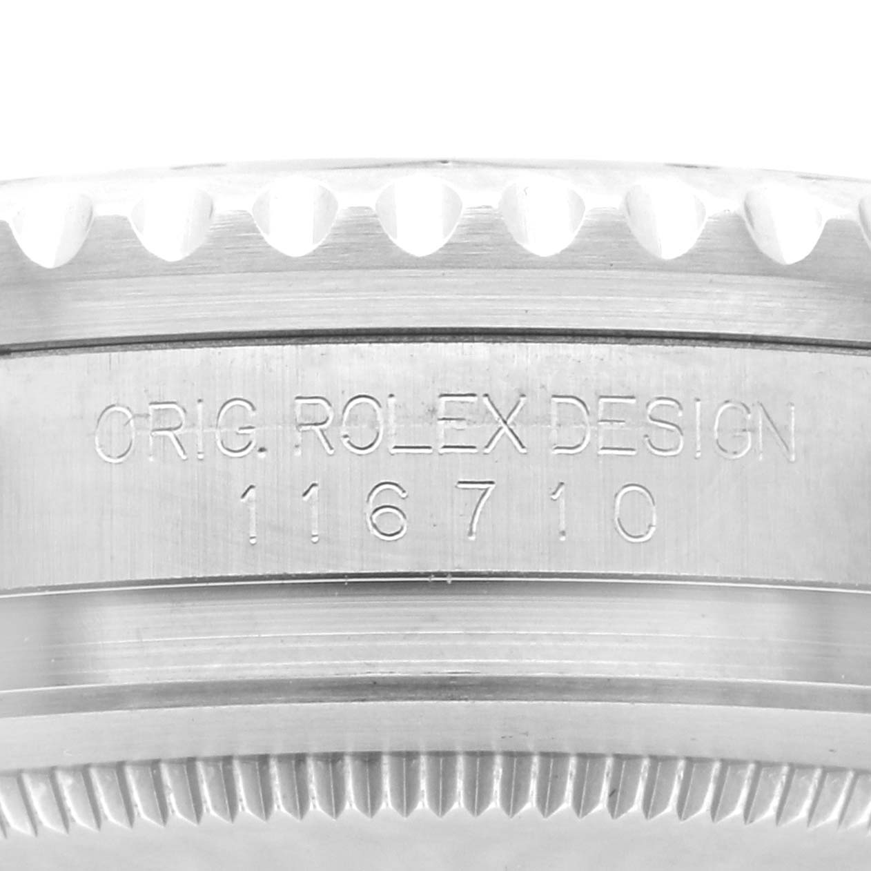 The image shows a side view of the case of a Rolex GMT-Master 116710LN Men's Stainless Steel Black Dial 116710LN Men's Stainless Steel Black Dial, highlighting the engraved model number.