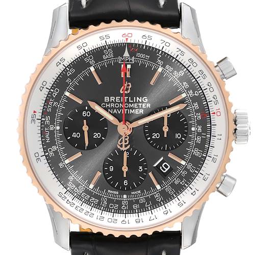 The image shows a close-up view of a Breitling Navitimer UB0121 Men's Steel and Gold (two tone) Grey Dial UB0121 Men's Steel and Gold (two tone) Grey Dial watch, highlighting its dial, chronographs, and bezel.