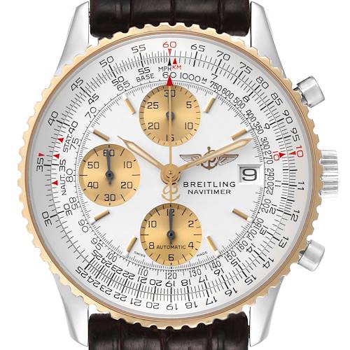 This image shows a close-up of the Breitling Navitimer D13322 Men's Steel and Gold (two tone) Silver Dial D13322 Men's Steel and Gold (two tone) Silver Dial watch's face, including its bezel, sub-dials, and part of the crown.