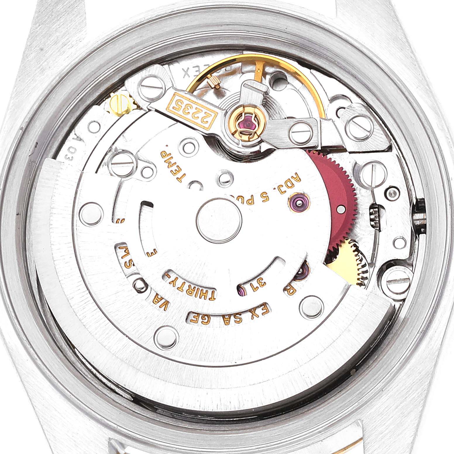 This image shows the internal mechanism, movement, and parts of a Rolex Datejust 79173 Women's Steel and Gold (two tone) Champagne Dial 79173 Women's Steel and Gold (two tone) Champagne Dial watch viewed from the back.