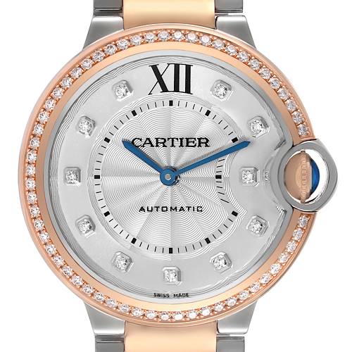 The image shows a close-up, front view of the Cartier Ballon Bleu W3BB0004 Women's Steel and Gold (two tone) Silver Dial W3BB0004 Women's Steel and Gold (two tone) Silver Dial watch face with diamond accents and blue hands.