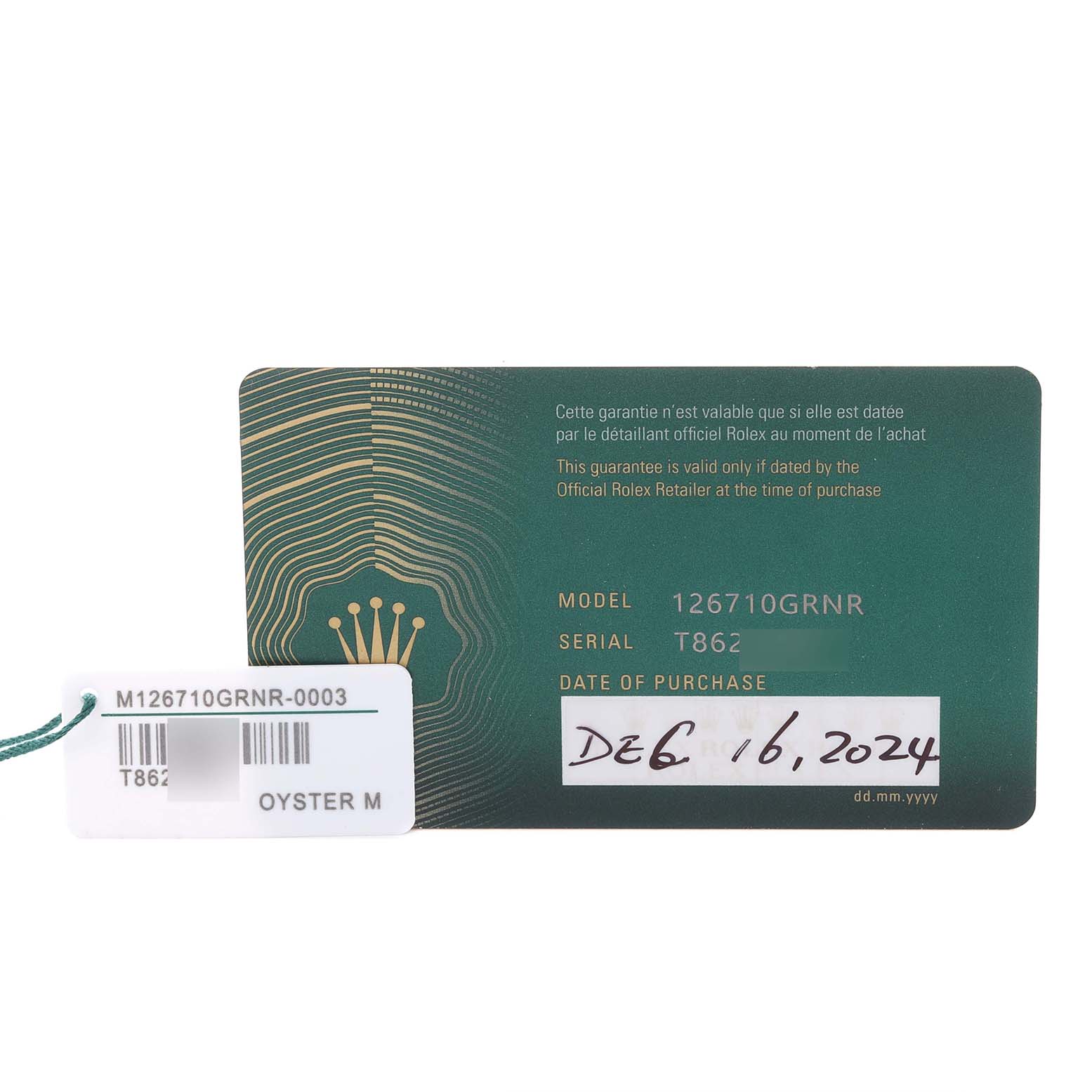 The image shows a warranty card and tag for a Rolex GMT-Master 126710GRNR Men's Stainless Steel Black Dial 126710GRNR Men's Stainless Steel Black Dial model, with model and serial numbers visible.