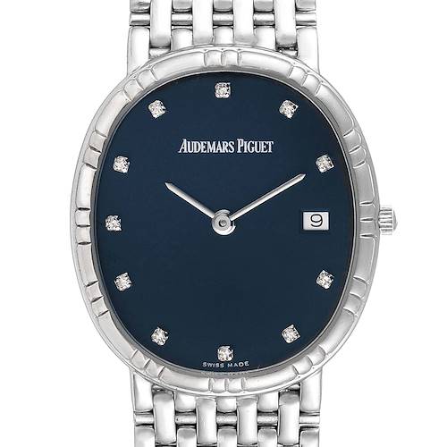 The image shows a full frontal view of the Vintage Audemars Piguet watch with a blue dial, date window, and metal bracelet.