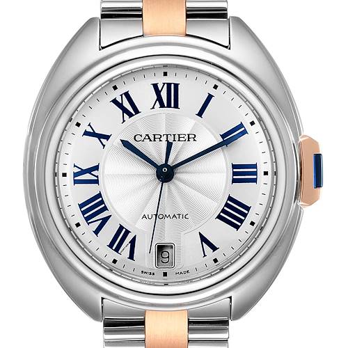 The image shows a close-up of the face and bezel of the Cle model by Cartier, including the dial, hands, and part of the bracelet.