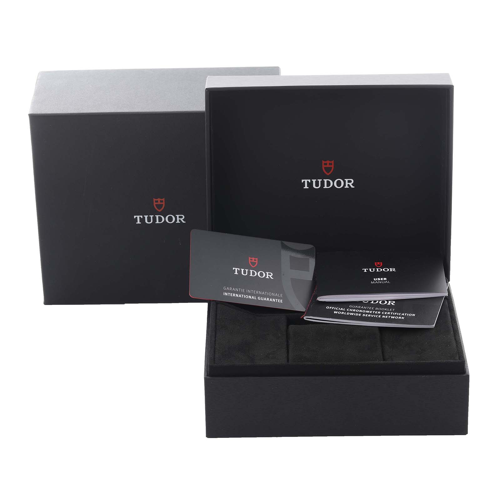 The image shows the packaging and accessories for a Tudor Pelagos 25827KN Men's Ceramic Black Dial 25827KN Men's Ceramic Black Dial watch, including a box, warranty card, and manuals.