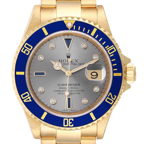 The image shows a front view of the Rolex Submariner 16618 Men's Yellow Gold Grey Dial 16618 Men's Yellow Gold Grey Dial watch, featuring a gold case, blue bezel, and a grey dial with a date window.