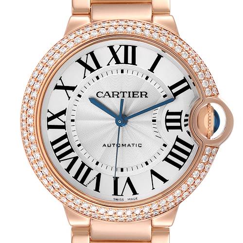 The Cartier Ballon Bleu WE9005Z3 Women's Rose Gold Silver Dial WE9005Z3 Women's Rose Gold Silver Dial watch is shown from a front angle, highlighting its diamond-adorned bezel, Roman numerals, and crown.