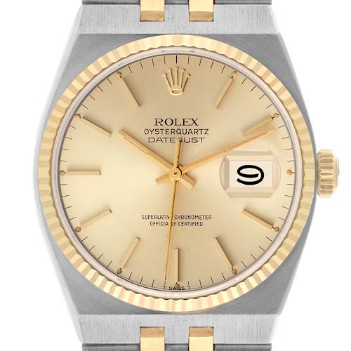 The image shows a frontal view of a Rolex Oysterquartz 17013 Men's Steel and Gold (two tone) Champagne Dial 17013 Men's Steel and Gold (two tone) Champagne Dial, highlighting its dial, crown, and part of the bracelet.