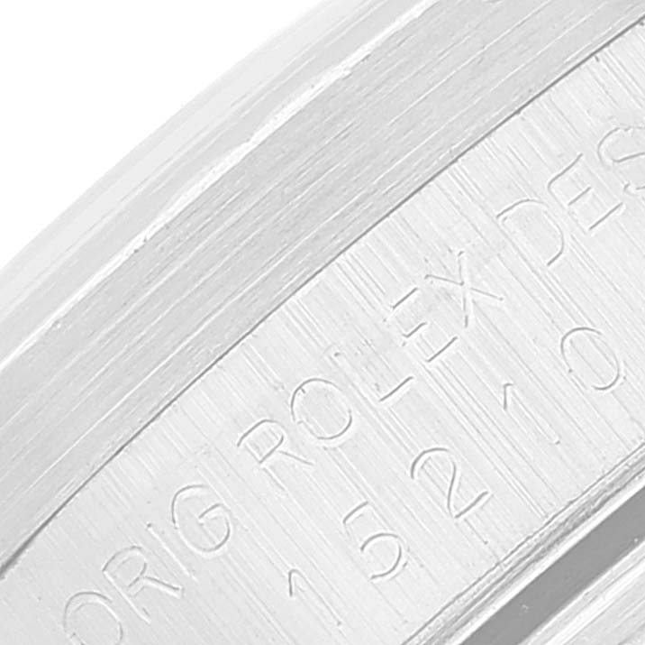 This close-up image shows the engraved inner bezel of the Rolex Date 15210 Men's Stainless Steel Silver Dial 15210 Men's Stainless Steel Silver Dial model watch.