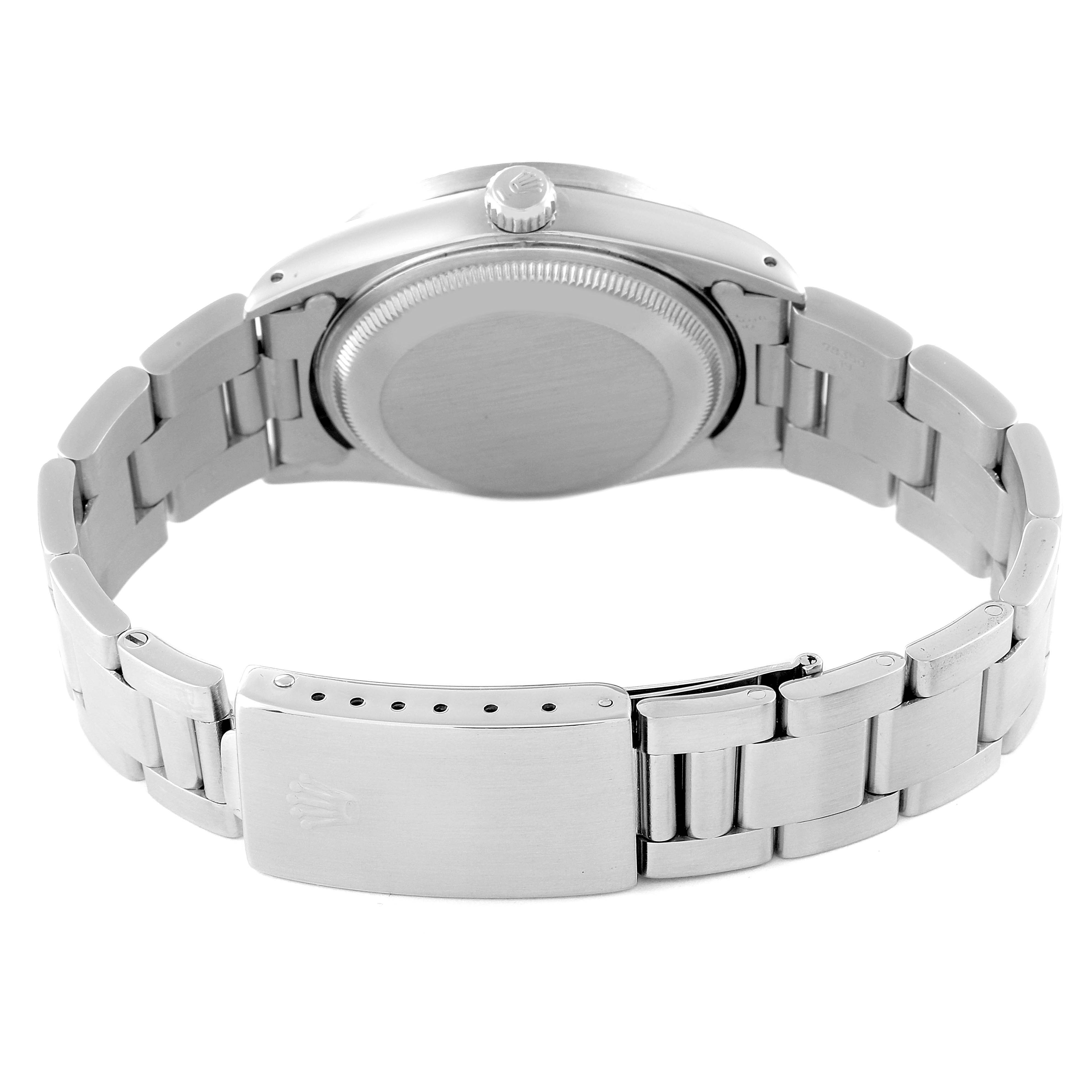 This image shows the back of the Rolex Date 15210 Men's Stainless Steel Silver Dial 15210 Men's Stainless Steel Silver Dial model, highlighting its clasp, bracelet, and case back.