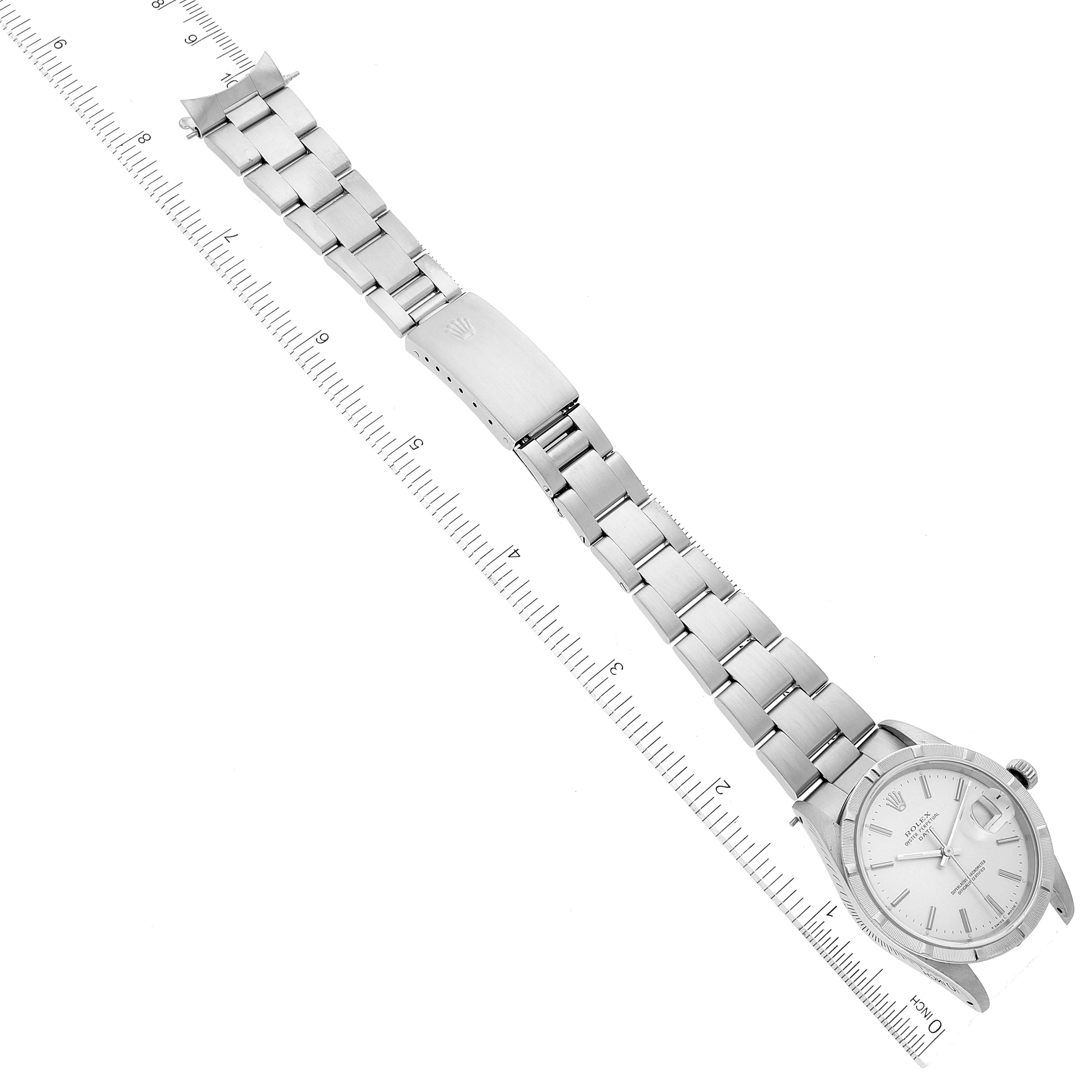 The image shows a top-down view of a Rolex Date 15210 Men's Stainless Steel Silver Dial 15210 Men's Stainless Steel Silver Dial model watch, displaying the full bracelet and part of the dial.