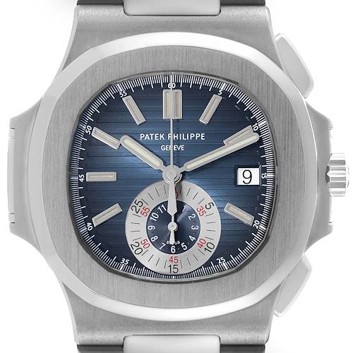 This image shows a close-up of the face and bezel of a Patek Philippe Nautilus 5980/1A-001 Men's Stainless Steel Blue Dial 5980/1A-001 Men's Stainless Steel Blue Dial watch, displaying its blue dial, hands, and date window.