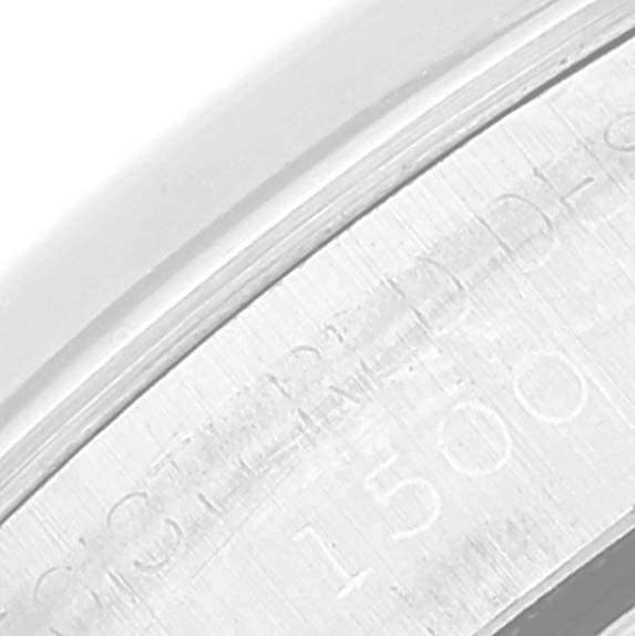 This is a close-up angle of the inner bezel with engravings on a Rolex Date 1500 Men's Stainless Steel Silver Dial 1500 Men's Stainless Steel Silver Dial model watch.