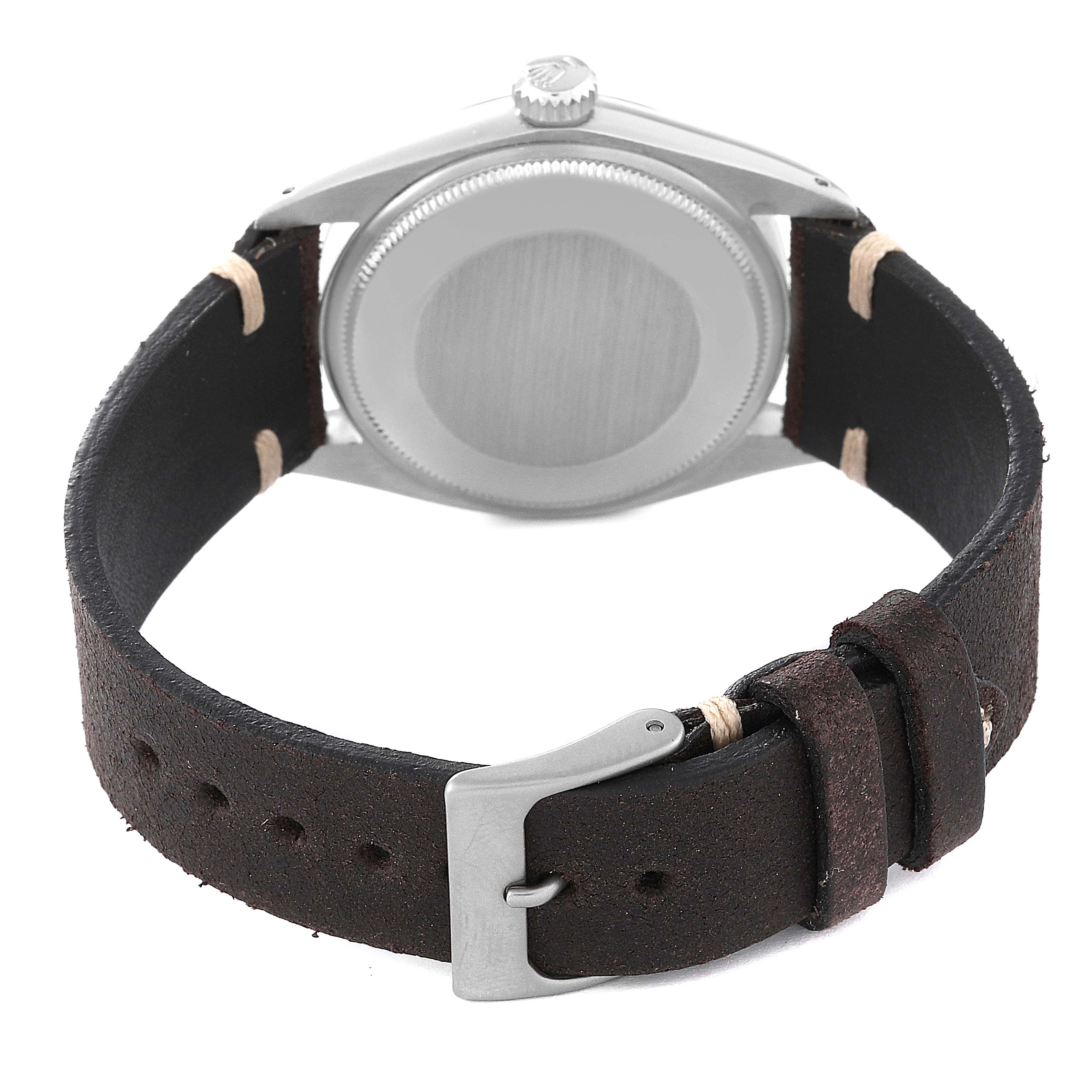 The Rolex Date 1500 Men's Stainless Steel Silver Dial 1500 Men's Stainless Steel Silver Dial model watch is shown from the back, highlighting its case and leather strap with a metal buckle.