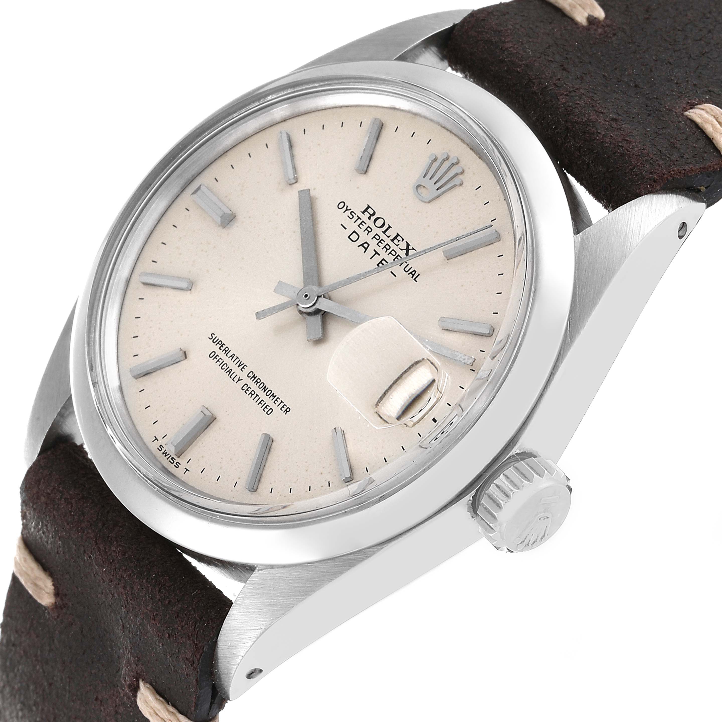 The image shows a close-up of a Rolex Date 1500 Men's Stainless Steel Silver Dial 1500 Men's Stainless Steel Silver Dial model watch, highlighting the dial, crown, and part of the leather strap.