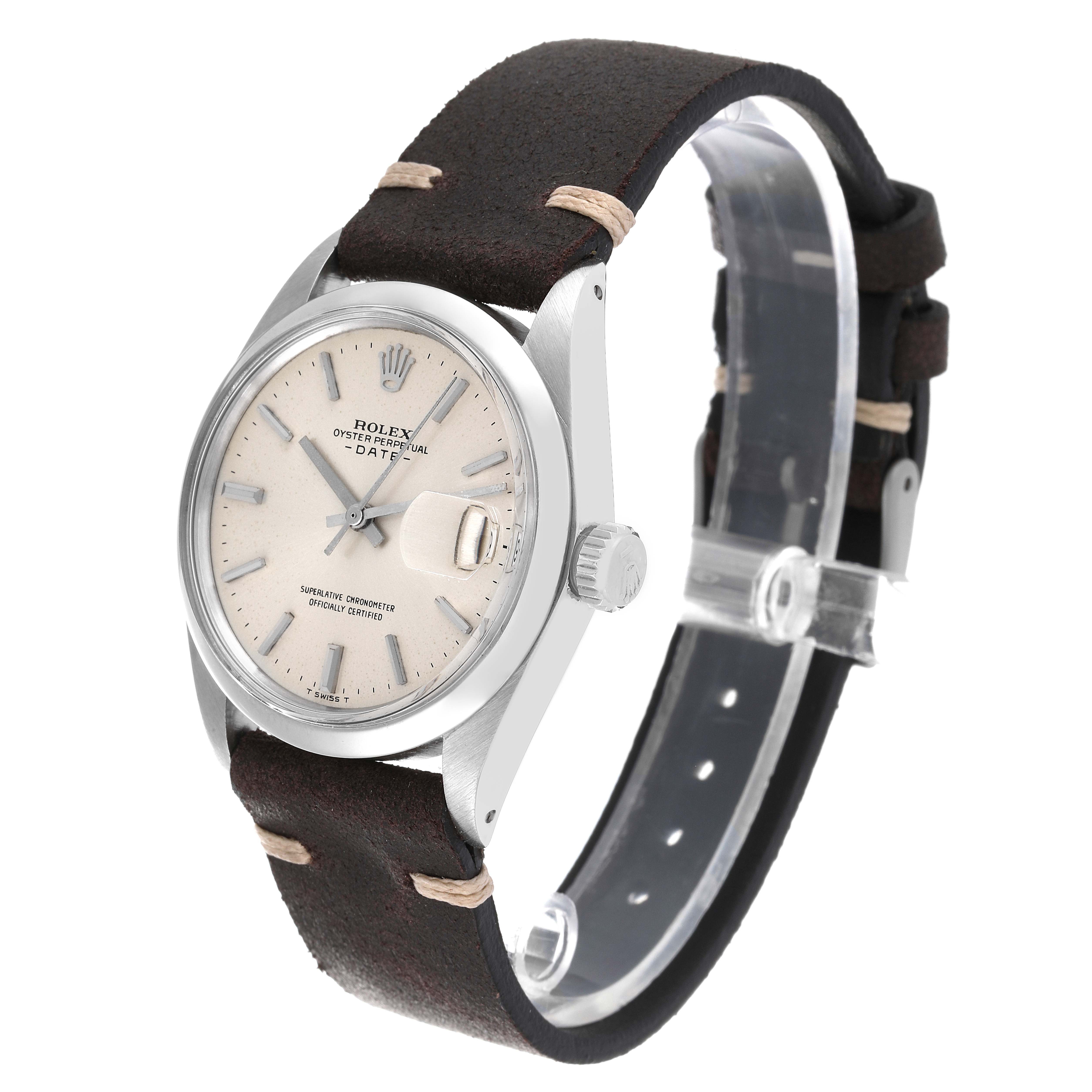 This is a Rolex Date 1500 Men's Stainless Steel Silver Dial 1500 Men's Stainless Steel Silver Dial model watch shown at a three-quarter angle, highlighting its dial, bezel, crown, and leather strap.