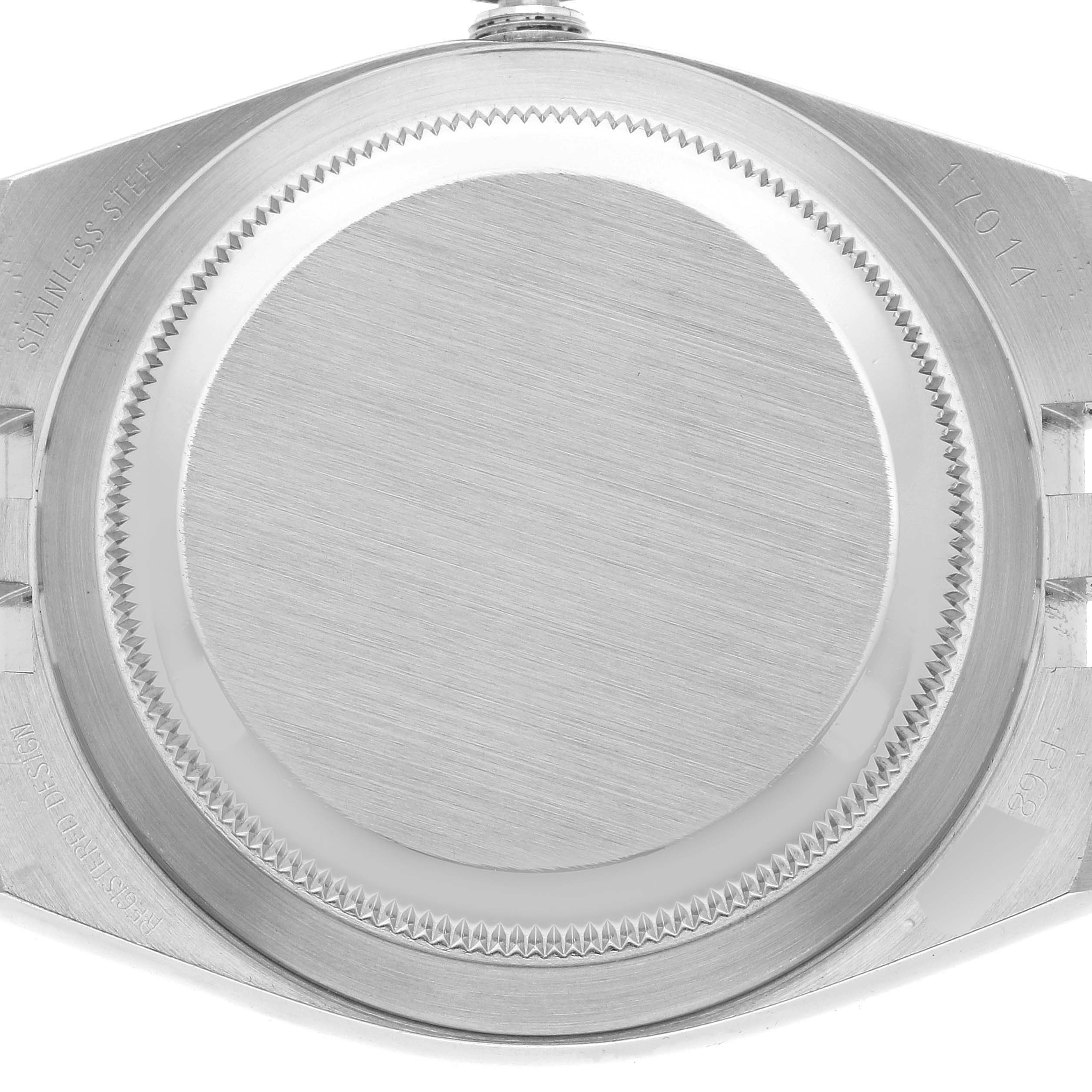 This image shows the stainless steel case back of a Rolex Oysterquartz 17014 Men's Stainless Steel Grey Dial 17014 Men's Stainless Steel Grey Dial watch from a top-down angle.