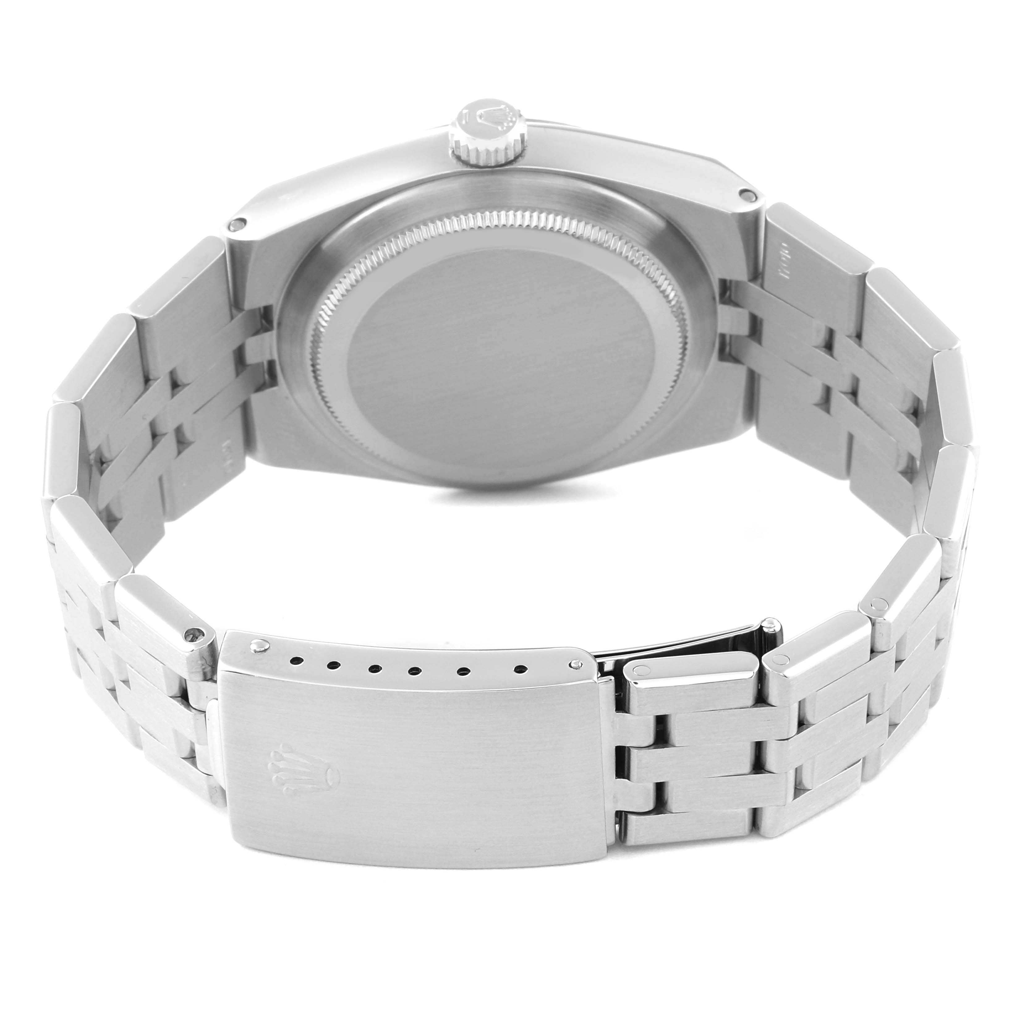 The image shows a Rolex Oysterquartz 17014 Men's Stainless Steel Grey Dial 17014 Men's Stainless Steel Grey Dial watch from the back, focusing on the case back, crown, and metal bracelet clasp.