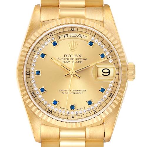 The image shows a close-up of the Rolex President 18238 Men's Yellow Gold Champagne Dial 18238 Men's Yellow Gold Champagne Dial Day-Date watch, displaying its face, bezel, and part of the bracelet.