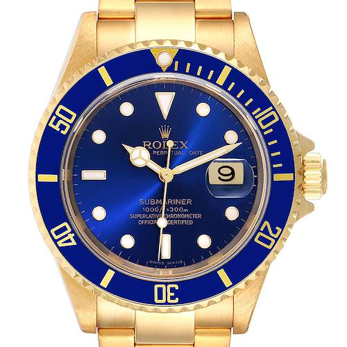 This Rolex Submariner 16618 Men's Yellow Gold Blue Dial 16618 Men's Yellow Gold Blue Dial watch is shown from a front angle, highlighting its golden case, blue dial, and bezel.